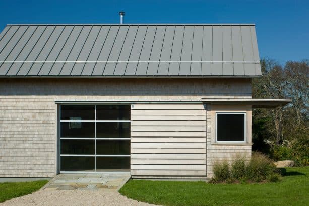 modern cottage garage apartment remodel with metal window and door