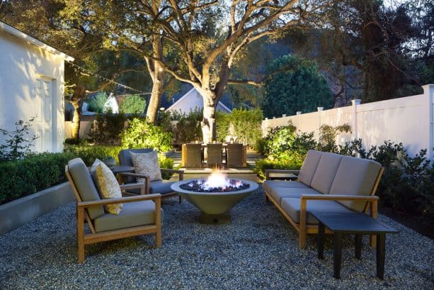 traditional pea gravel fire pit with a set of comfortable seats