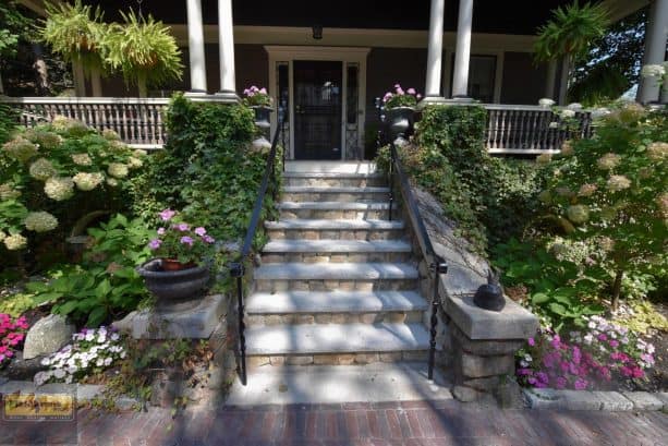 thin stone veneer stair covering for a beautiful and welcoming house