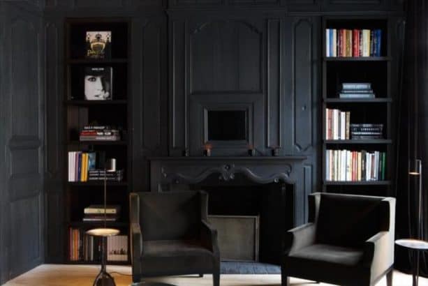 living room with matte black wall and trim paint color