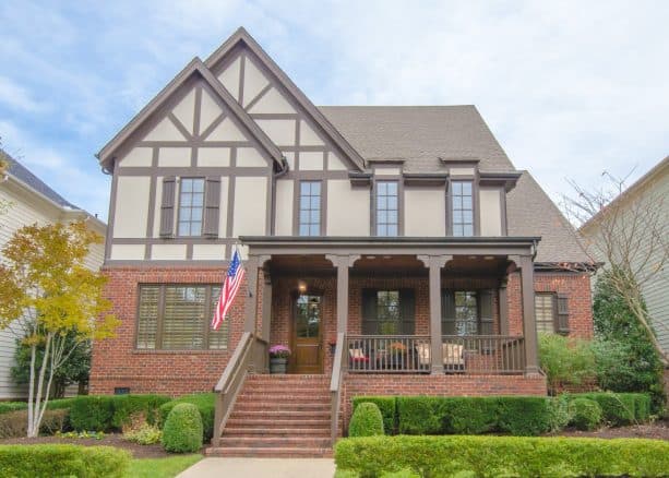 benjamin moore - middlebury brown exterior trim color in a mixed siding beige house