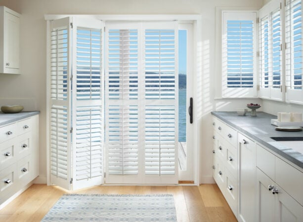 hunter douglas shutters for both kitchen door and windows