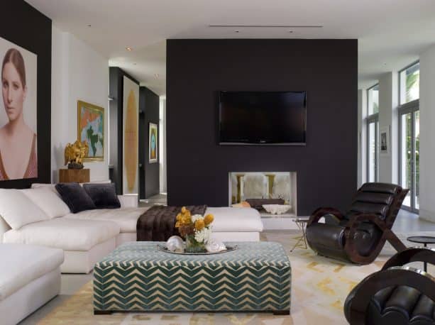 black and white contemporary living room with white and gold rug