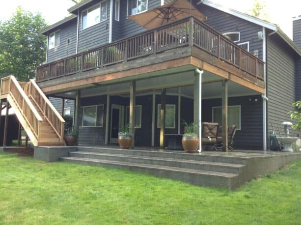 raised under deck patio with front steps