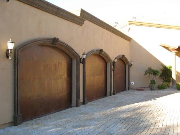 wood brown trim for a Tuscan brown stucco in Mediterranean-style exterior