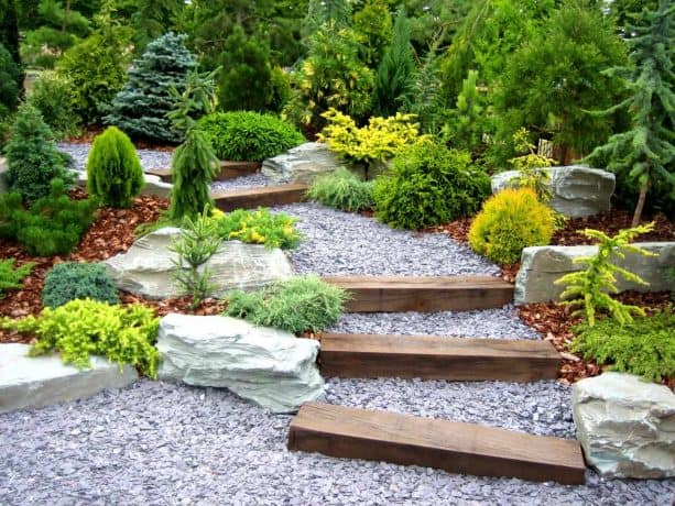 japanese style landscape with stained cedar steps on a pebbled slope