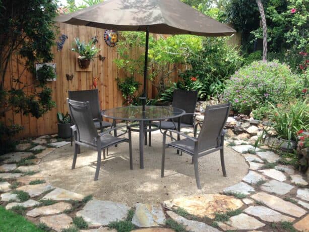 using a combination of flagstone and creeping thyme as a patio border