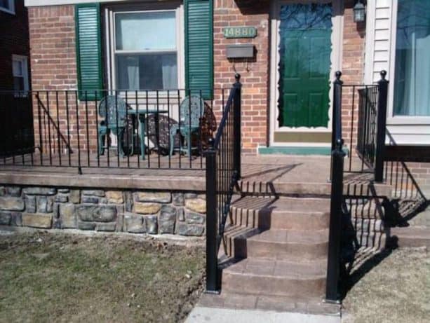 combining a concrete front porch with a brick exterior wall