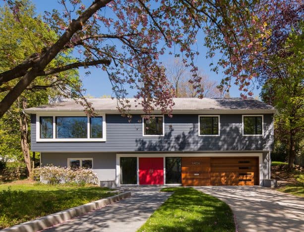 combine wescott navy vinyl siding and a poppy door to improve your ranch style house’s looks