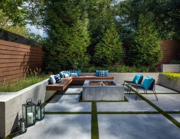 a stylish patio design with concrete paver and fire pit plus a floating bench