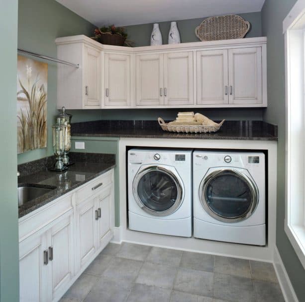 white and sage green laundry room