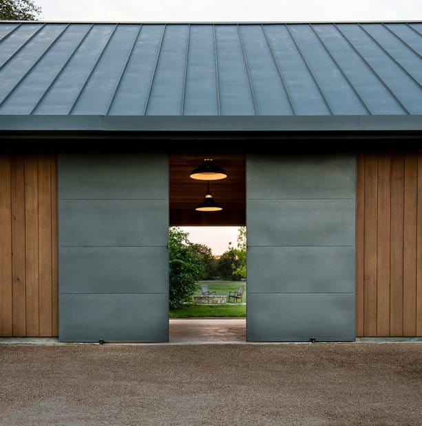 blued steel sliding barn doors are perfect for exteriors as they don’t rust