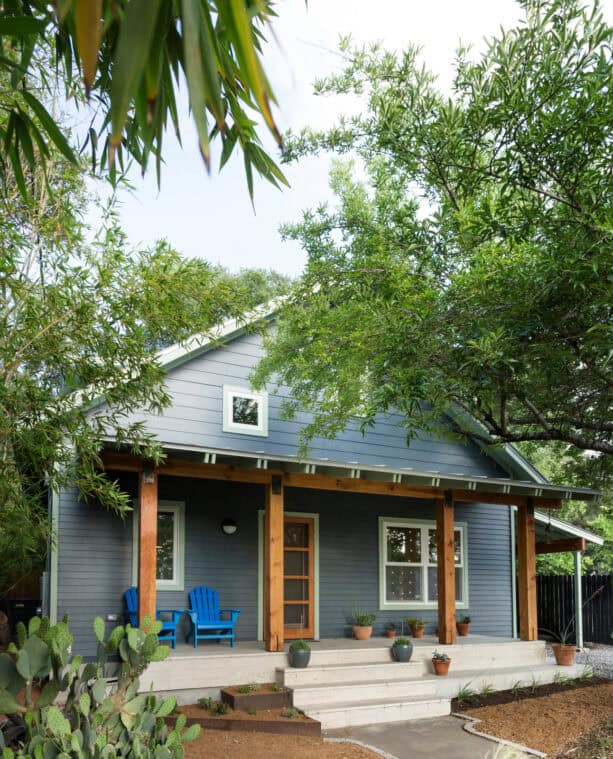 brightly colored seating area in a craftsman-style front porch