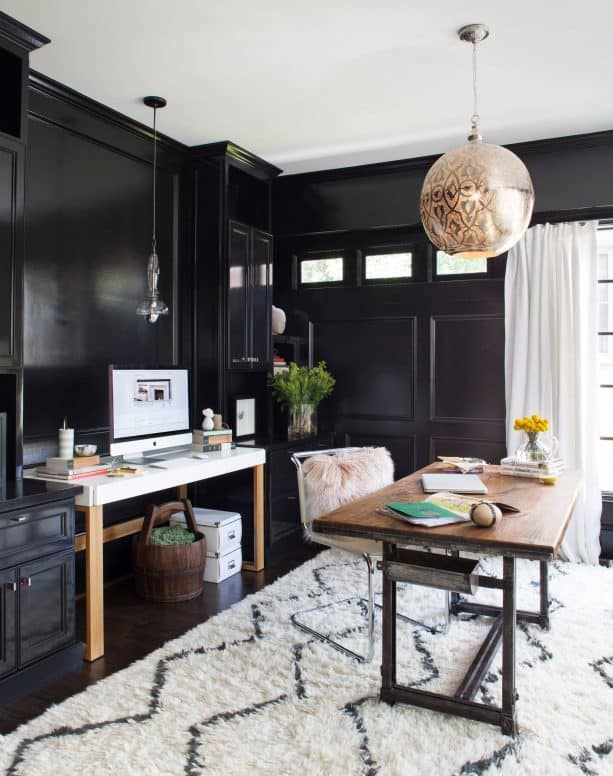 transitional home office with black wall and trim paint color