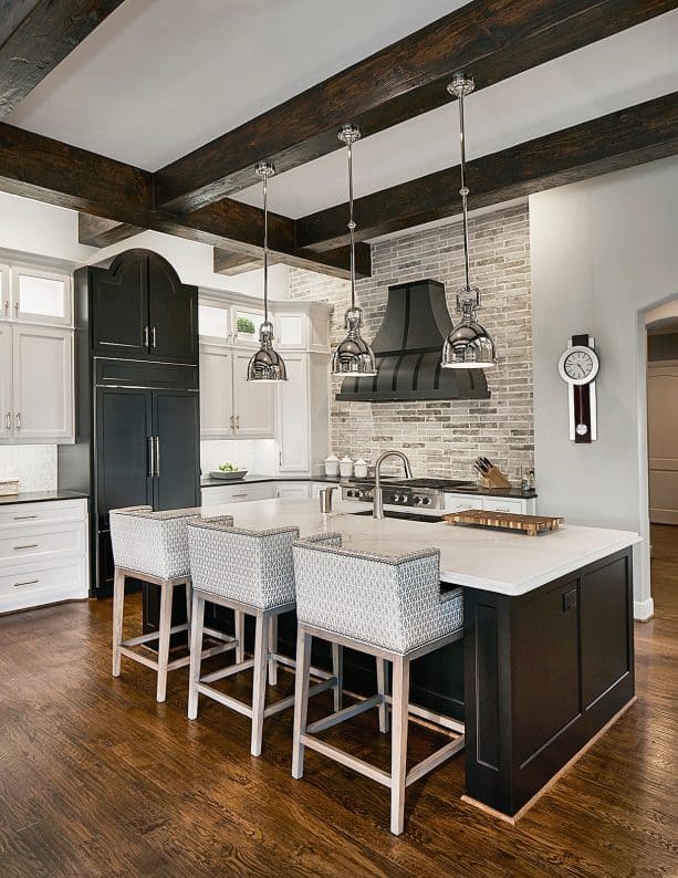 transitional kitchen with neutral grey wall and plywood floor with oak finish