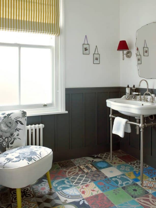 powder room with black board and batten wainscoting