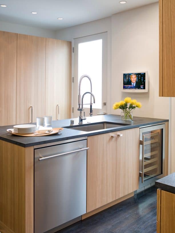 quarter sawn oak cabinets with black countertops for an ultra modern look