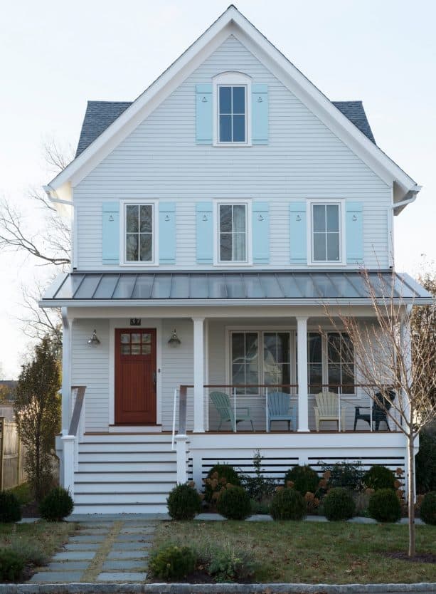 hardi-plank-arctic white home remodel with light blue window shutters