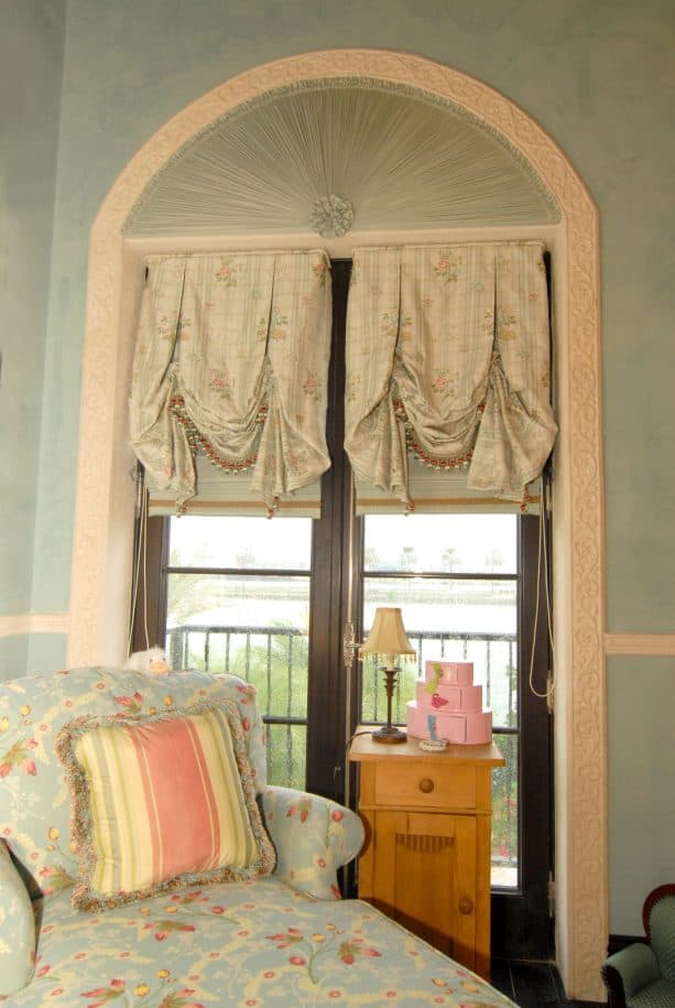 decorative balloon shades for the french door in a girl’s bedroom