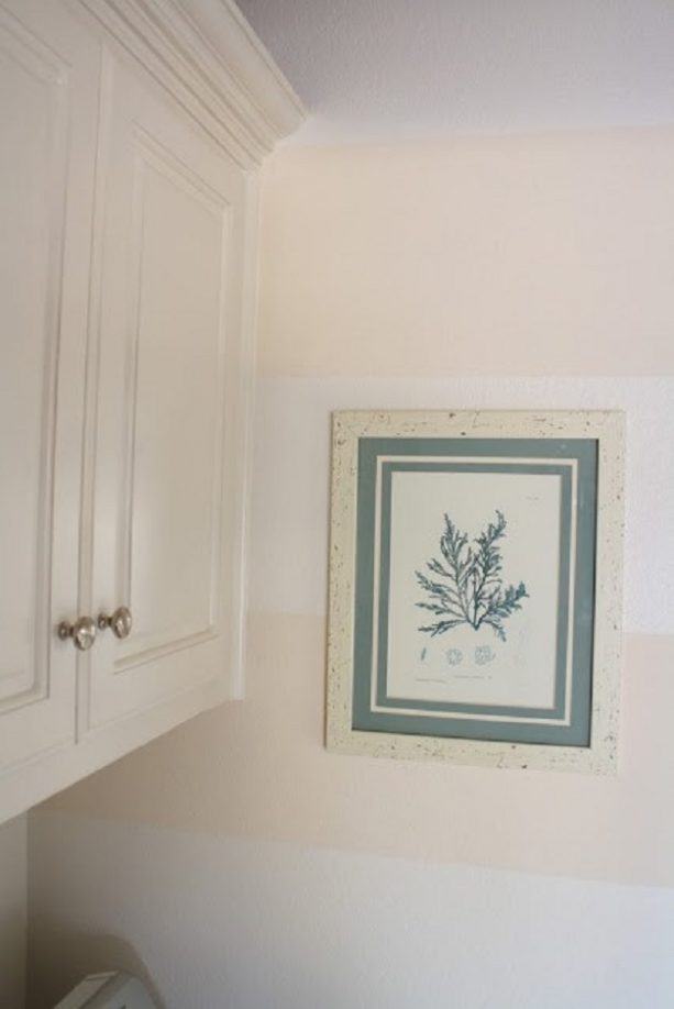 stripes laundry room wall with regular white paint and Glidden Antique White paint combination