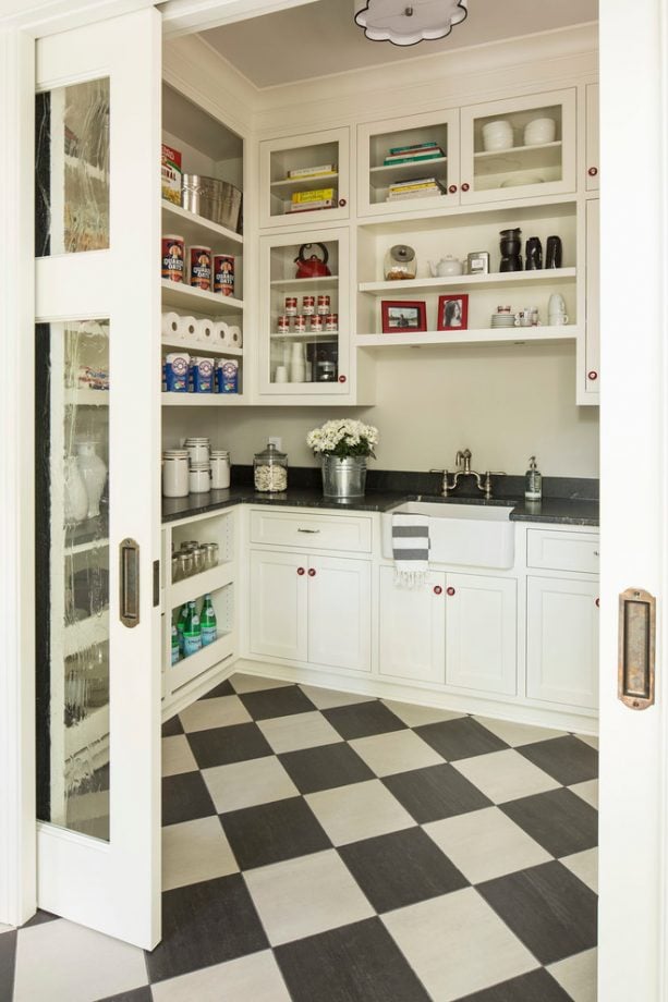 diamond-style black and white checkered ceramic tile floor in a transitional kitchen design