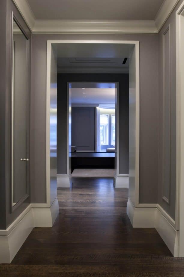 contemporary hall with dark grey wall and stained white oak floor