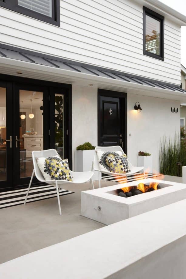 home exterior with white stucco material paired really nicely with black trim for the doors and windows