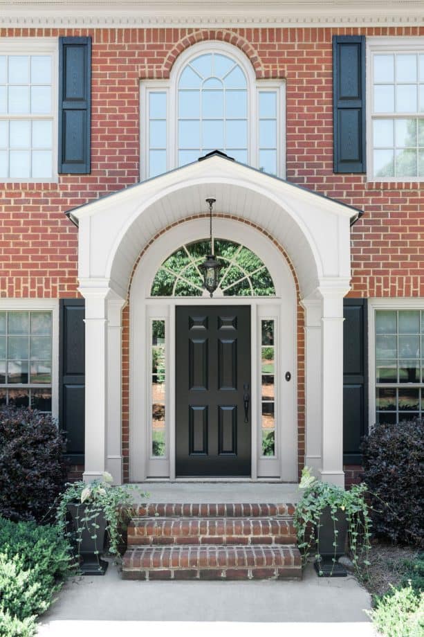 black and white color scheme in a front door portico with glass element