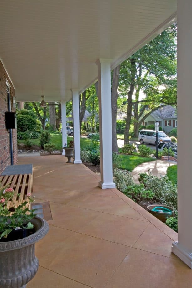 staining the concrete to mimic the tile as a minimalist front porch