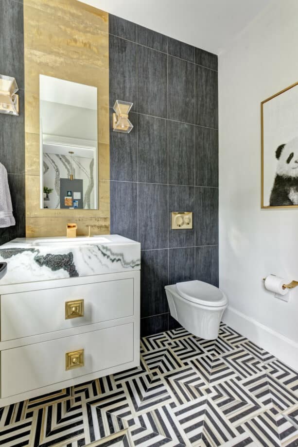 when two accent walls made of grey and gold tiles combine and beautify a transitional bathroom