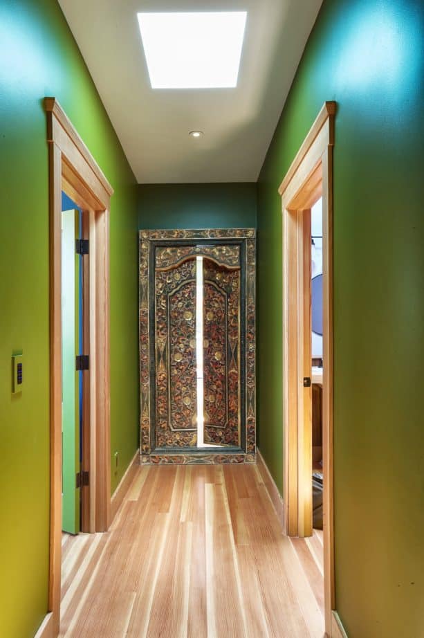 antique door in balinese style in a farmhouse hallway