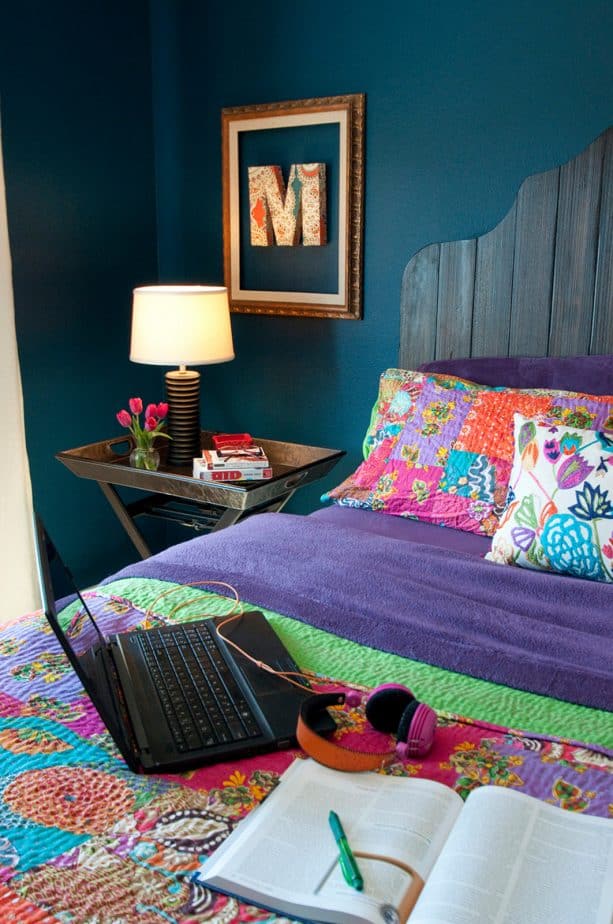 design an eclectic bedroom with teal walls and iris bedding