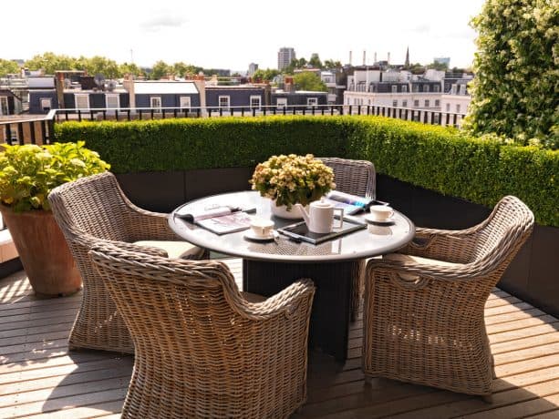 full coverage for deck railing offered by fencing plants in planters