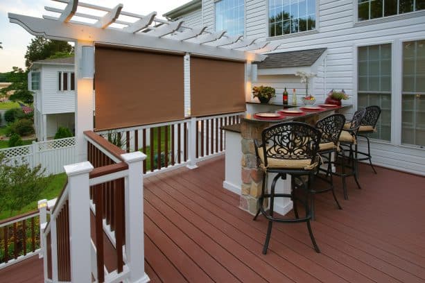 pergola and roll-up blinds as a privacy screen on deck railing