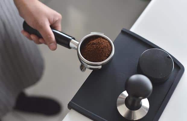 Uniform coffee grounds in a portafilter