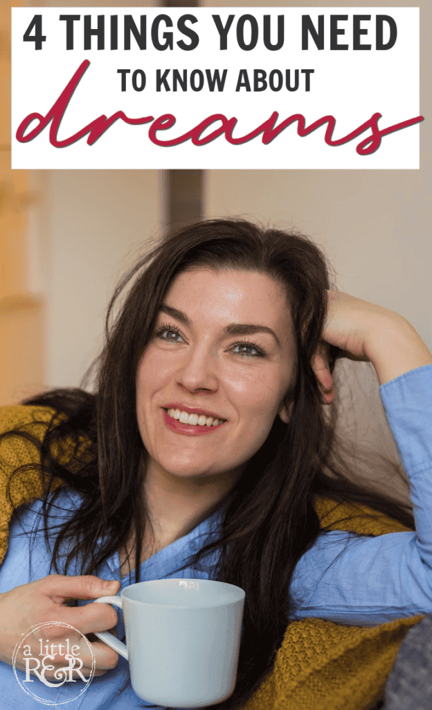 woman sitting on couch with coffee mug, resting head on fist and smiling