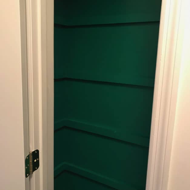 emerald green hall closet makeover with eclectic pretty storage