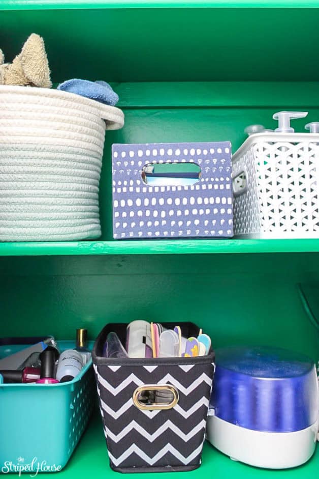 emerald green hall closet makeover with eclectic pretty storage