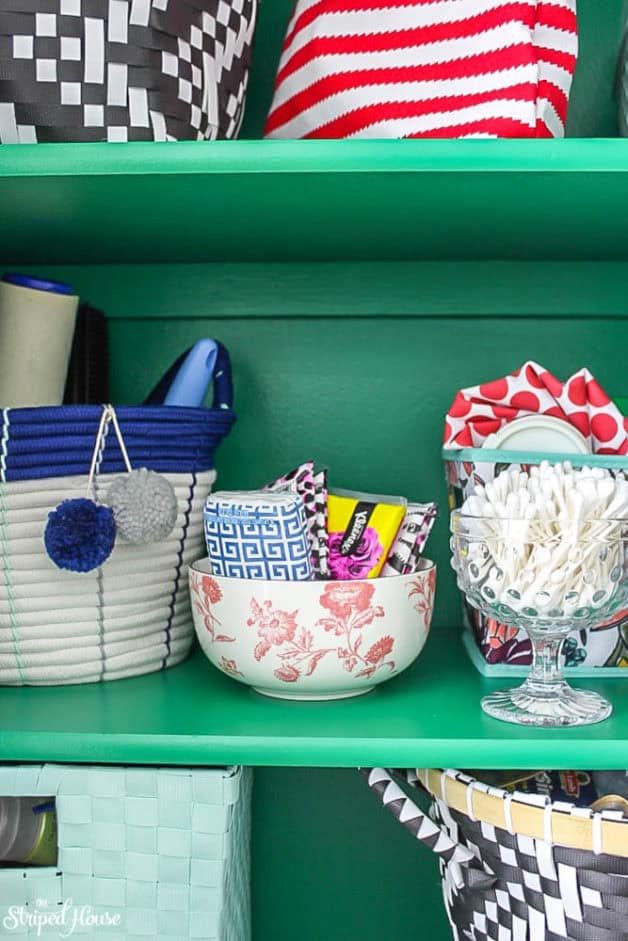 emerald green hall closet makeover with eclectic pretty storage