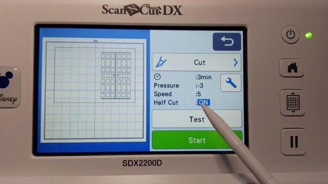 Screen showing your added design and the Cut button,Test button, plus Start.