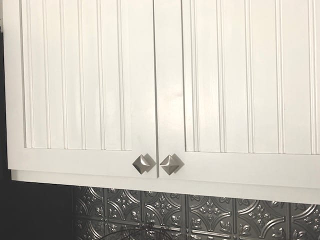 white beadboard kitchen cabinets