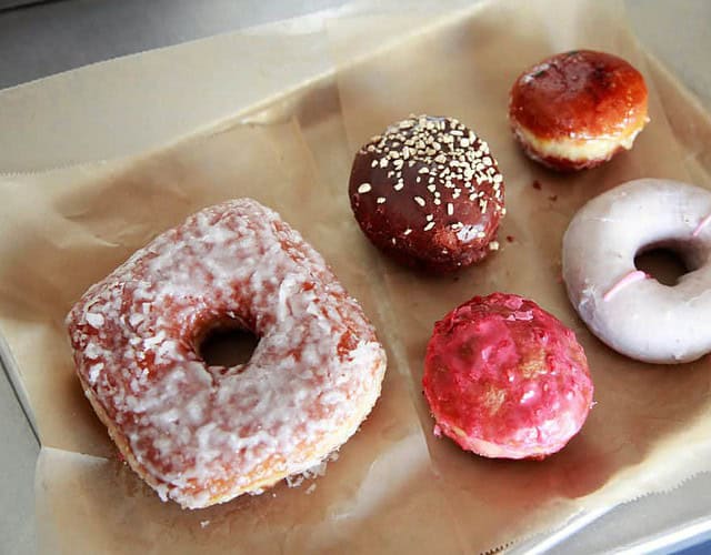 Doughnut plant's square and mini doughnuts, glazed or filled, are not your usual morning coffee companions