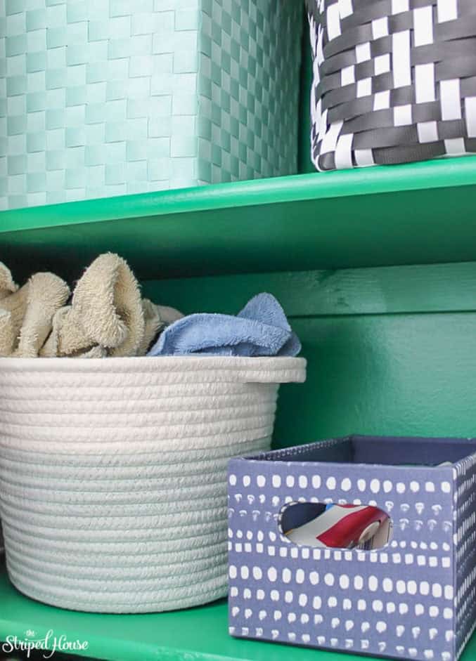 emerald green hall closet makeover with eclectic pretty storage