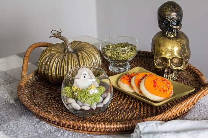 halloween terrarium on tray with cookies and pumpkins