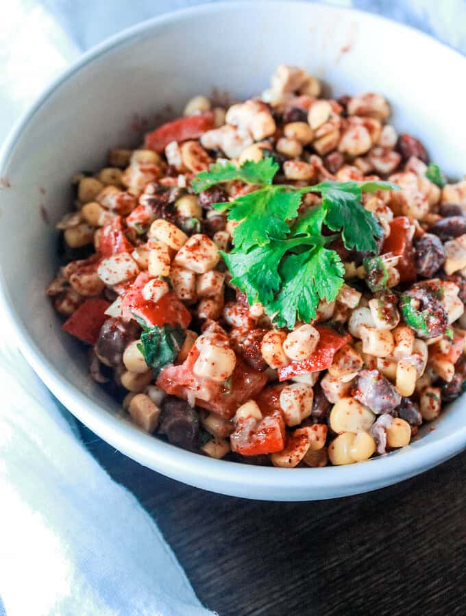 Easy Mexican Street Corn Salad recipe with black beans. It’s a perfect summer side dish recipe!