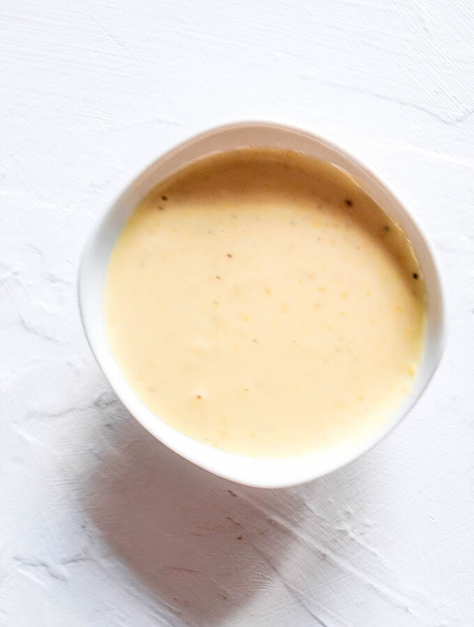 Healthy, oil-free, gluten-free dressing that works well with salads, tacos, buddha bowls, and vegetable sides! #dressing #maple #healthy #homemade
