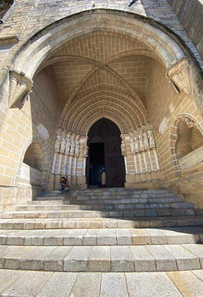 The Evora Cathedral entrance on a sunny day.