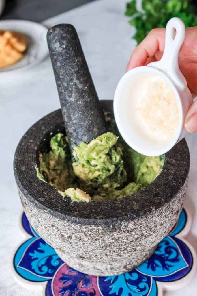 Easy, homemade, Chunky Mango Guacamole recipe that is perfect for a crowd or as a snack! #mango #guacamole #veganappetizer