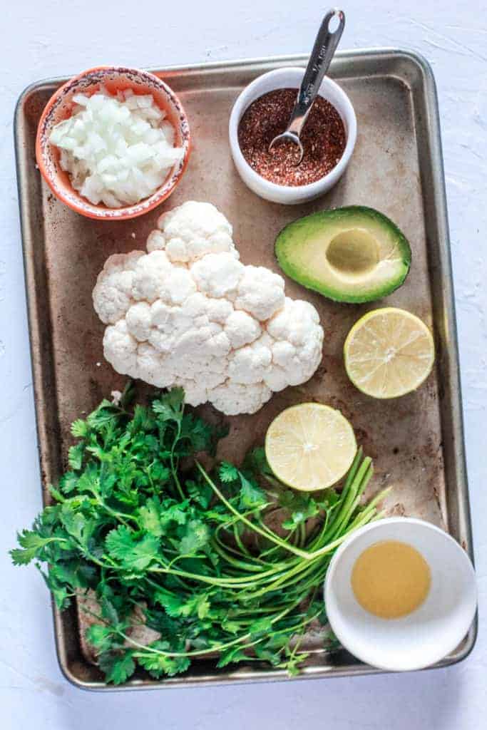 Tasty vegan tacos made with cauliflower as taco meat grilled in a skillet! This taco recipe is delicious and ready in 20 minutes!