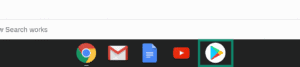 Chromebook taskbar displaying multiple application icons, with the Google Play Store icon highlighted inside a green box.